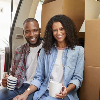 Couple taking a break while moving